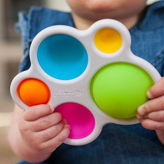 child holding dimple tablet